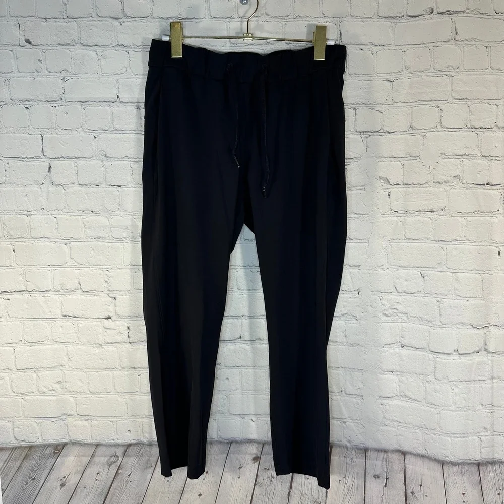 Lululemon On the Fly 7/8 Tapered Pant Black Luxtreme Jogger Size 6 LW5ATES